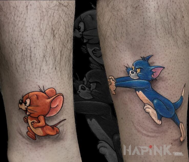 Tattoo Tom &Jerry in colorful motif and cartoon / comic book style on the leg