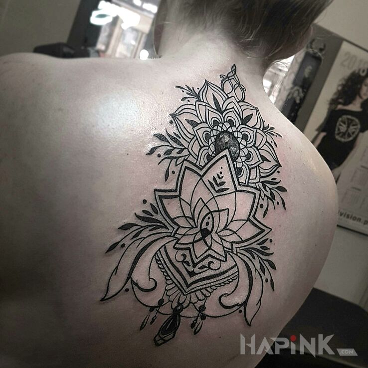 Tattoo Mandala in mandalas motif and graphic / illustrative style on the back