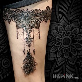Tattoo Mandala on the leg motif: black and gray style: graphic / illustrative
