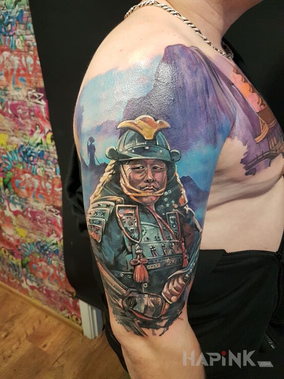 Tattoo SAMURAI in characters motif and realistic style on the upper arm