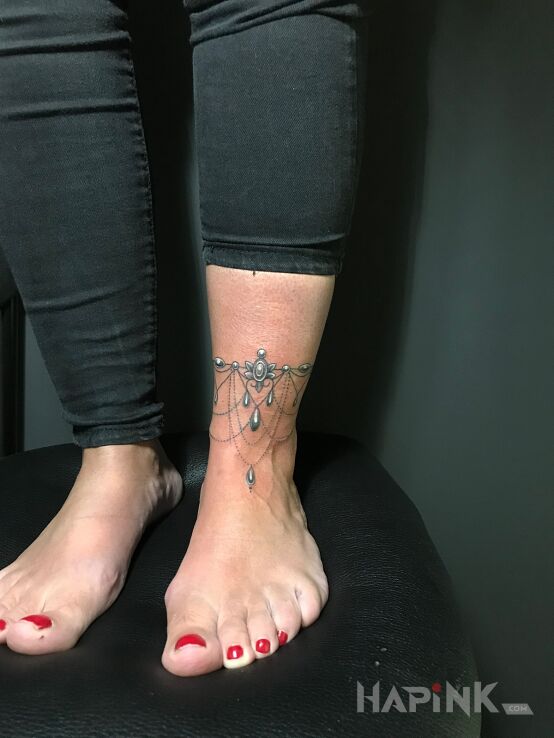 Tattoo Ozdoba in ornaments motif and graphic / illustrative style on the tibia