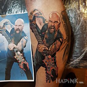 Tattoo SLAYER K.... on the calf motif: faces style: realistic