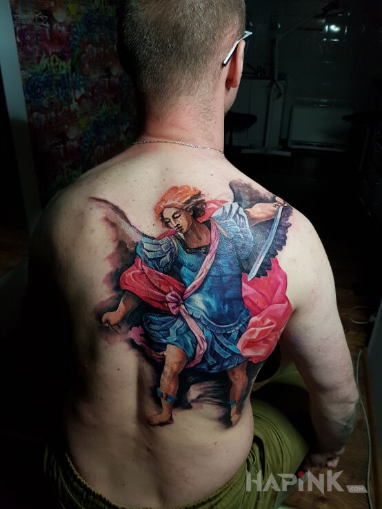 Tattoo ANIOŁ in colorful motif and realistic style on the back