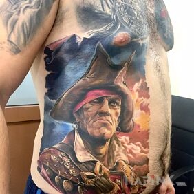 Tattoo PIRAT on the stomach motif: faces style: realistic