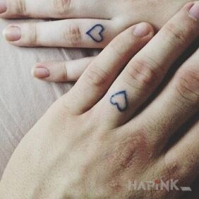 Tattoo Hearts two on the fingers motif: Love