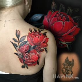 Tattoo Flowers on the shoulder blades motif: cover-up style: realistic