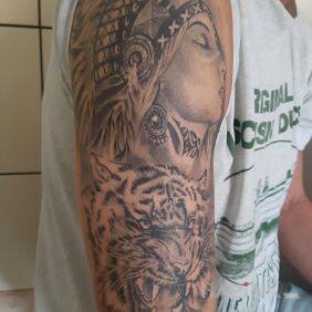Tattoo The Indian woman and the tiger on the upper arm motif: Indian style: realistic