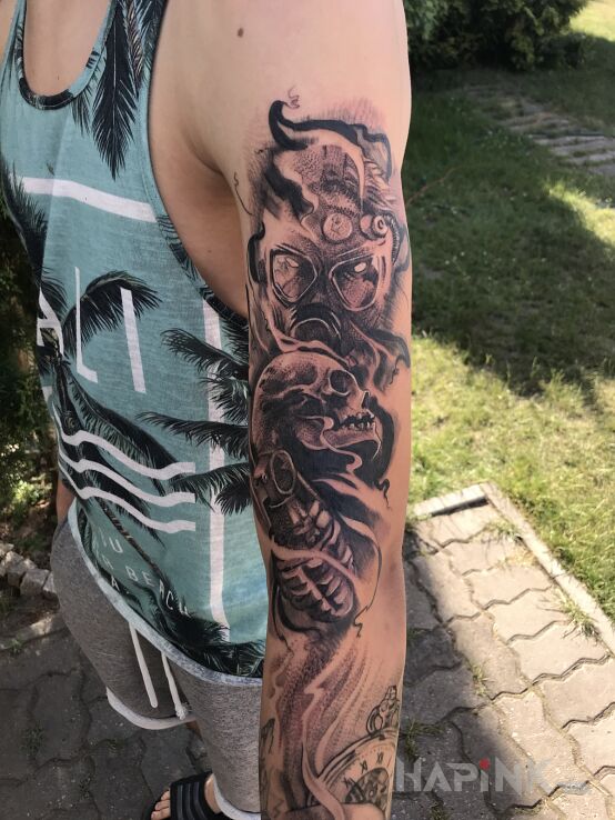 Tattoo Rękaw in black and gray motif and realistic style on the upper arm