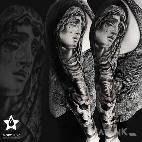 Tattoo Angels and demons on the forearm motif: religious style: realistic