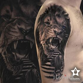 Tattoo Fear not ;) on the upper arm motif: black and gray style: realistic