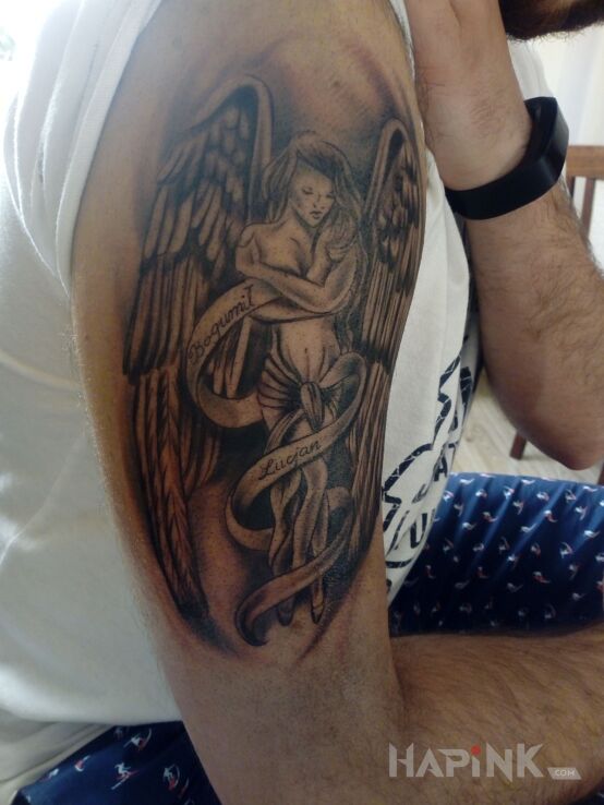 Tattoo Anioł stróż in angels motif and graphic / illustrative style on the upper arm
