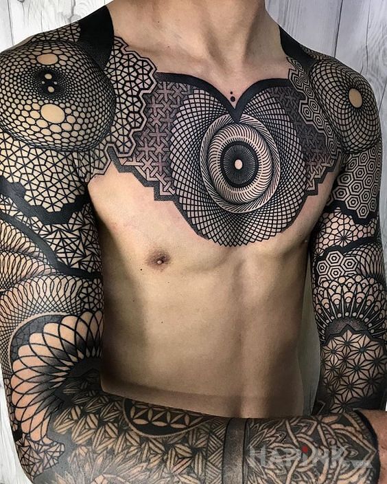 Tattoo GEO in mandalas motif and geometric style on the collarbone