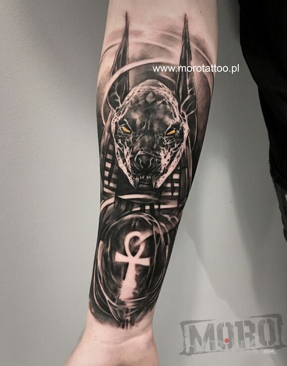 Tattoo Anubis od Igoryoshi in black and gray motif and realistic style on the forearm