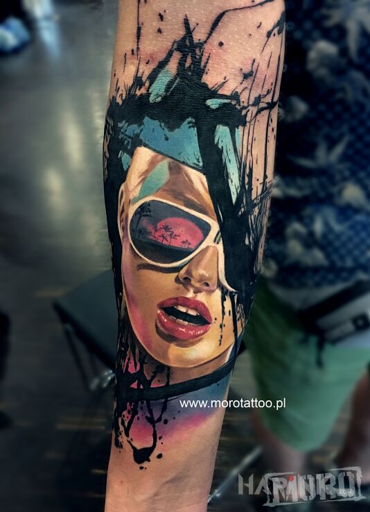 Tattoo Abstract realism in colorful motif and realistic style on the forearm