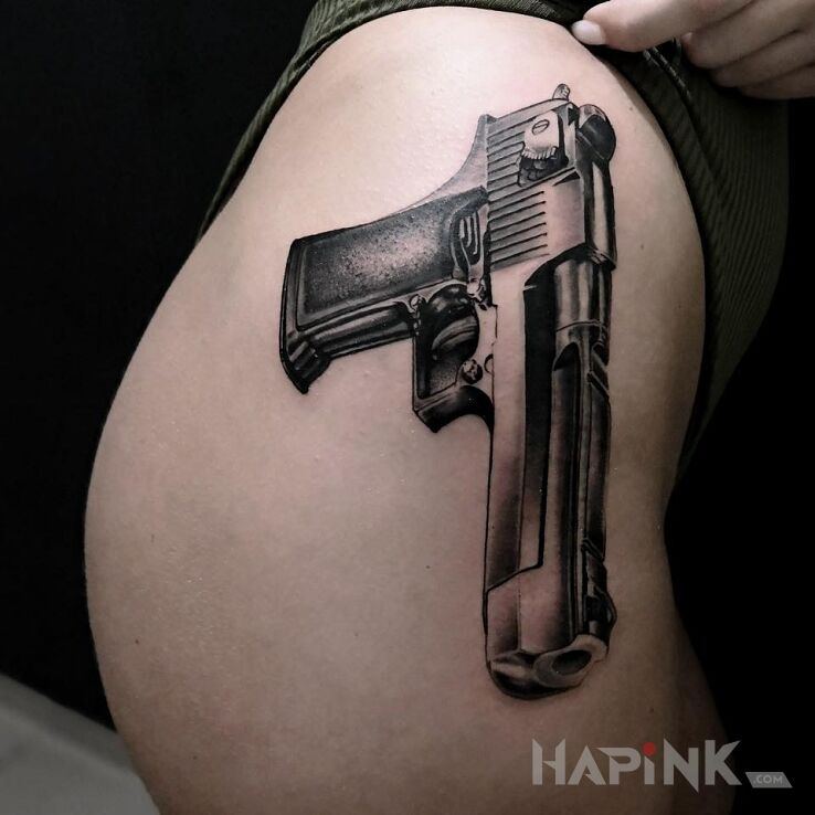 Tattoo Girls like a GUN in objects motif and realistic style on the leg