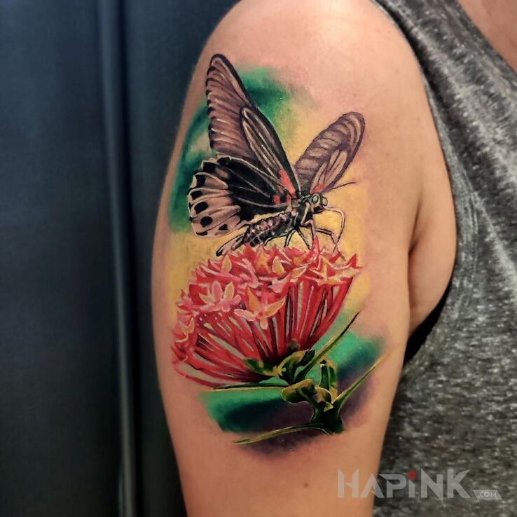 Tattoo Motyl i kwiat in butterflies motif and realistic style on the upper arm
