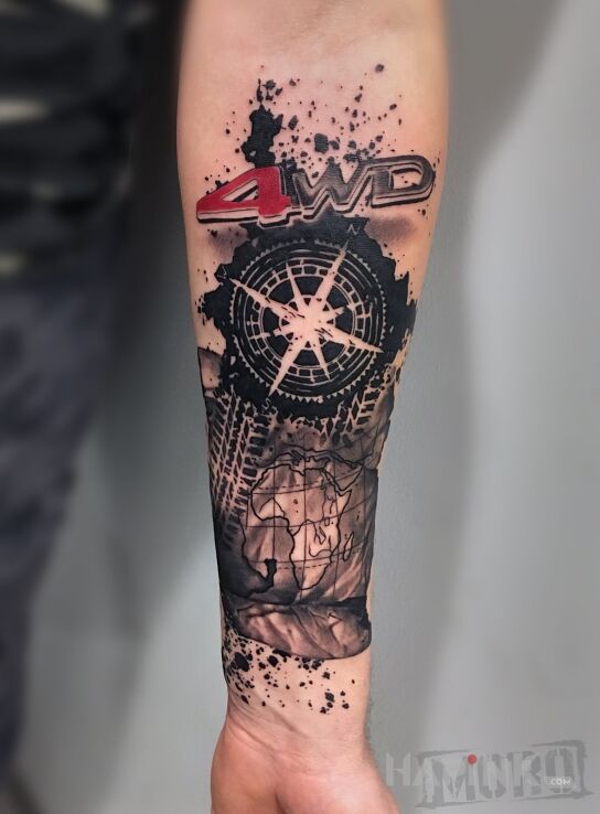 Tattoo Moto in black and gray motif and graphic / illustrative style on the forearm
