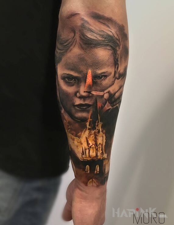 Tattoo Dziewczyna z zapałką in faces motif and realistic style on the forearm