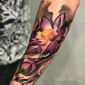 Tattoo Purple flower on the forearm motif: flowers style: graphic / illustrative